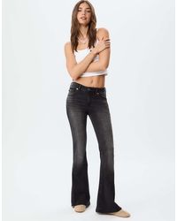 Stradivarius - D04 Low Rise Flared Jeans - Lyst