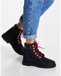 Botas negras planas Timberland de Cuero de color Negro | Lyst