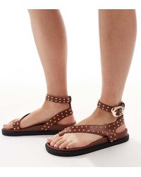 London Rebel - Sandali Bassi Infra-Alluce Colo Cuoio Con Borchie A Pianta Larga - Lyst