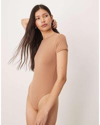 agon® - Short Sleeve Crew Neck Bodysuit - Lyst