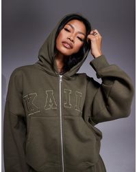 Kaiia - Sweat à capuche zippé oversize d'ensemble en coton majoritaire avec logo brodé - kaki - Lyst
