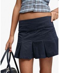 Bench x Superdry & Co - Logo Pleated Peached Mini Skirt - Lyst