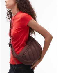 TOPSHOP - – cora – gesteppte nylon-umhängetasche - Lyst