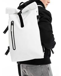 Rains - Mochila Grande Blanco Pastel Impermeable Con Detalles En Contraste Y Parte Superior Enrollable De - Lyst