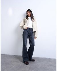 TOPSHOP - Pippa Mid Rise Comfort Stretch Flare Jean - Lyst