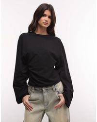 Weekday - – langärmliges, tailliertes t-shirt - Lyst
