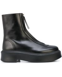 The Row Zipped Leather Ankle Boots - Black