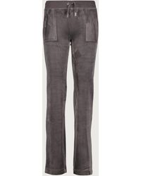 juicy couture track pants with juicy on the bum