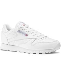 white reebok trainers