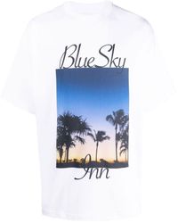 Heren Kleding voor voor T-shirts voor T-shirts met korte mouw BLUE SKY INN Katoen T-shirt Met Logoprint in het Geel voor heren 