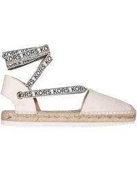 Michael Kors Willis Wedge Trainer in White - Save 15% | Lyst