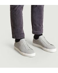 grey axel arigato