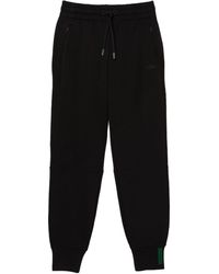 Lacoste Track pants and sweatpants for Women | Online Sale up to 68% off |  Lyst