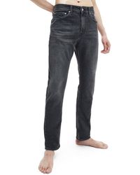 calvin klein slim taper jeans