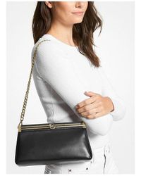 Michael Kors for Women to 66% off at Lyst.com
