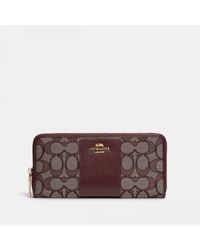 coach wallet cost
