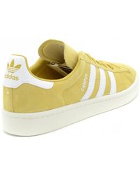 yellow adidas trainers