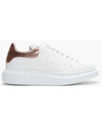 black and rose gold trainers