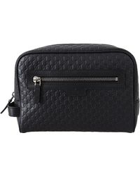 black gucci toiletry bolsa