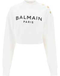 Balmain - Beschnittenes Sweatshirt mit Logo -Druck und Knöpfen - Lyst
