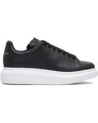 McQueen - Sneakers basse oversized in pelle nera - Lyst