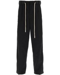 Palm Angels - Pantaloni in cotone con coulisse e bande laterali - Lyst