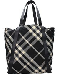 Burberry - Umhängetaschen Frauen Stoff schwarz/beige - Lyst