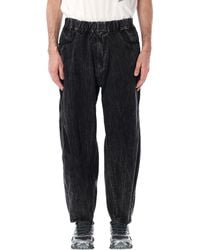 and wander - Textured Trousers - Lyst