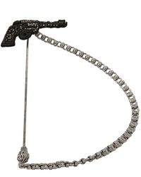 Dolce & Gabbana Épinglette de chaîne de pistolet à revolver en laiton et cuivre - Métallisé