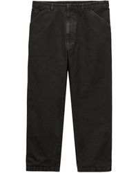 Prada - Vaqueros de pernera ancha con logo triangular de - Lyst