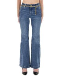 MICHAEL Michael Kors - Flared Jeans With Belt-Donna - Lyst
