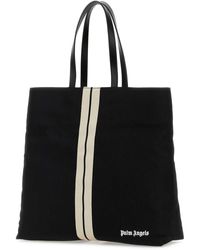 トートバッグ Palm Angels Ivory Canvas Shopping Bag Palm Angels logo-print Canvas Tote Bag | White | FARFETCH