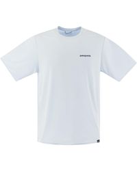 Patagonia - T-shirt en tissu technique avec imprimé à l'arrière - Lyst