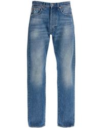 Valentino Garavani - Jeans With Metallic V Detail - Lyst