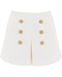 Balmain - Pantalones cortos de crepe de con botones en relieve - Lyst