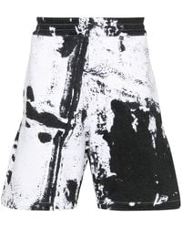 McQueen - Pantalones cortos con manchas de pintura - Lyst