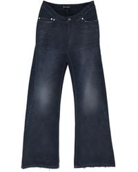 Balenciaga - Curved Denim Jeans - Lyst