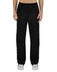FAMILY FIRST - Pleated Pants - Lyst