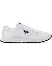 Prada - Side Logo-Plaque Low-Top Sneakers - Lyst