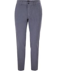 BOSS - Pantalones chinos de corte slim de algodón elástico de - Lyst