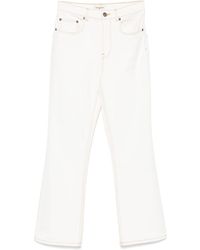 Tory Burch - Flared Leg Denim Jeans - Lyst