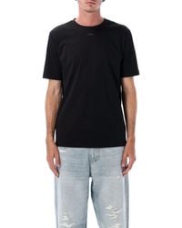 DIESEL - T-shirts et polos noirs - Lyst