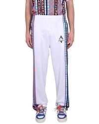 Marcelo Burlon - Jogging Pants With High Neck And Zipper Closure - Lyst