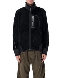 and wander - Und Wander Coats Schwarz - Lyst