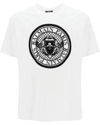 Balmain - T-shirt avec imprimé de monnaie affluée - Lyst