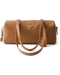 Prada - Medium Leather Top Handle Bag With Padlock - Lyst