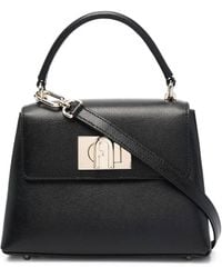Furla - Schwarze Leder Handtasche - Lyst