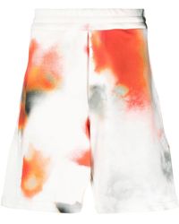 McQueen - Organic Cotton Bermuda Shorts With Obscured Flower Print - Lyst