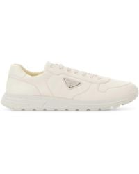 Prada - Solid Sneakers - Lyst