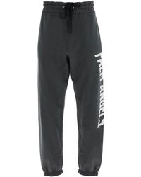 Palm Angels - Jogger Pants With Oversized Logo - Lyst